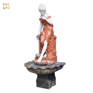 Marble fountain sculpture of seated woman in red dress