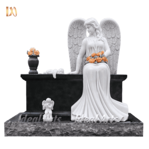 Hand-carved marble angel memorial headstone with roses