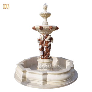 Outdoor marble fountain with classical female sculptures